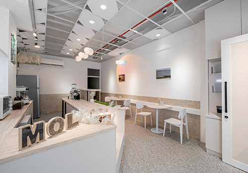 MUSE Design Awards Winner - White MOL Cafe by CXN Interior Design